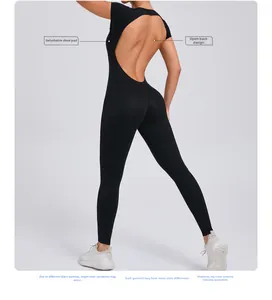 Detail view of backless black yoga bodysuit with cut-out design and removable padding