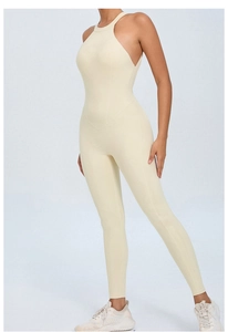 Side view of backless beige yoga jumpsuit showing slim fit and peach butt lift effect