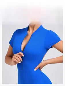 Close-up of blue short-sleeve yoga bodysuit featuring a half-zip neckline and slim fit