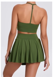 Back view of olive green halter sports top and pleated tennis skirt set for outdoor fitness