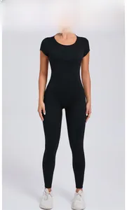 Detailed view of black short-sleeve yoga jumpsuit with a snug fit for fitness