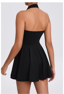 Back view of black halter tennis dress with open back and pleated skirt for sports