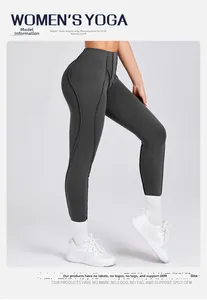 Dettaglio dei leggings da yoga grigio scuro a vita alta con cuciture ergonomiche e vestibilità
