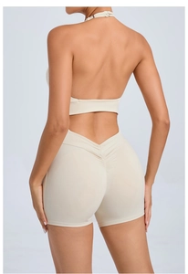 Detail view of the scrunch design and back texture of these high-waisted yoga shorts