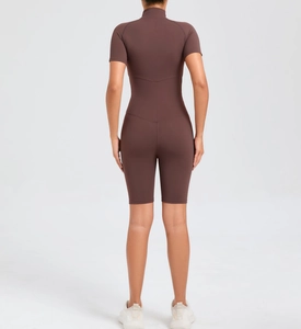 Back view of a cocoa brown athletic bodysuit with slimming V-shaped seams and high elasticity