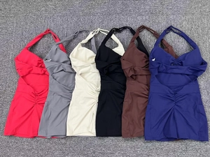 Detail view of backless halter yoga rompers in six colors with breathable elastic fabric