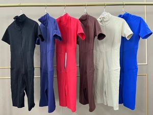 Front zipper detail on short sleeve yoga bodysuits in six different color options