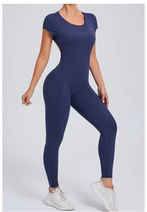 Close-up of tight-fit navy blue yoga bodysuit with backless design and lifted hip cut