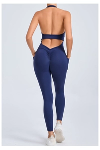 Close-up of navy blue yoga jumpsuit featuring a backless design and scrunch butt detail