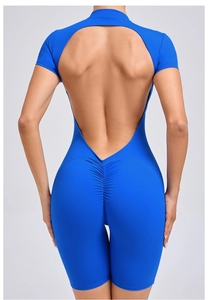 Detail of royal blue yoga jumpsuit showing open heart-shaped back and ruched butt lifting