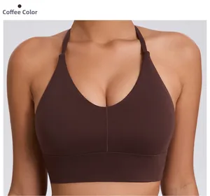 Detail of coffee-colored sports bra with V-neckline and adjustable halter straps