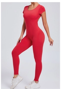 Detail view of red high-elastic sports jumpsuit with open back and body-shaping design