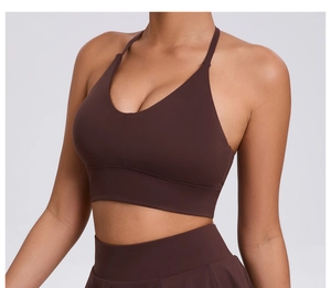 Close-up of deep brown sports bra featuring a V-neckline and adjustable slim straps