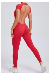 Detail of red backless yoga bodysuit with V-shape waist stitching and short sleeves