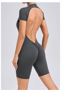 Macro detail of high-elasticity fabric and scrunch butt seam on grey yoga jumpsuit