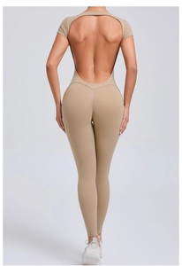 Macro shot of backless design and crossover strap on the tight yoga jumpsuit