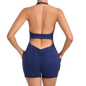 Navy blue backless halter yoga bodysuit with scrunch design and side pockets