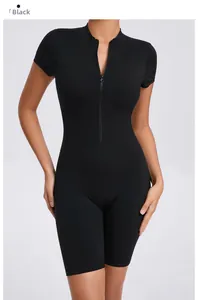 Close-up detail of front zipper and stand collar on this black short sleeve athletic bodysuit