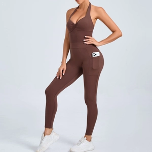 Brown halter yoga jumpsuit with side pockets and backless design for fitness and sports