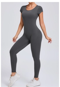 Detail view of charcoal grey backless sports bodysuit with tight fit and elastic fabric