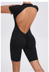 Close-up of the back cutout design and ruched lifting seam on black yoga jumpsuit