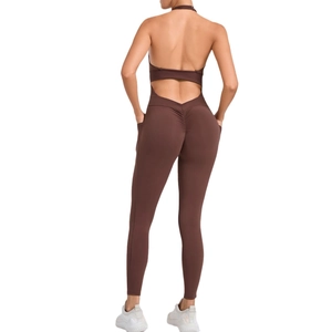 Brown halter neck backless yoga jumpsuit with side pockets and scrunch butt detail