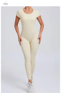 Detail of beige athletic bodysuit featuring backless design and high-stretch fabric