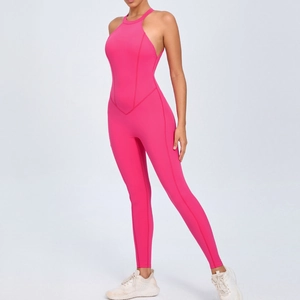 Slim fit bright pink yoga jumpsuit with cut-out back and sleeveless athletic design
