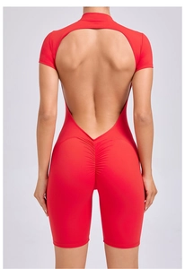 Close-up of red open-back yoga bodysuit with ruched detailing on the back
