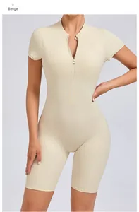 Detail of cream yellow sports bodysuit with stand collar and front zipper closure