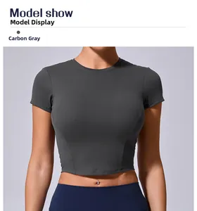 Slim fit charcoal gray athletic crop top for women during gym and yoga model show