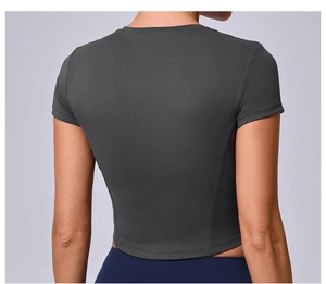 Close-up of seamless stitching and slim-fit back design of grey short sleeve yoga crop top