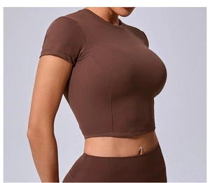 Close-up of brown slim fit quick-dry yoga crop top showing fine fabric texture