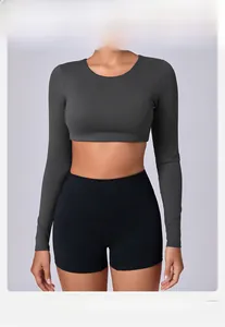 Detail view of high-elasticity breathable brushed fabric on women's gym yoga top