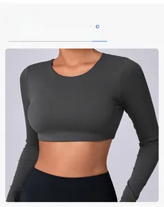 Close-up of dark grey long-sleeved crop top yoga shirt with round neck and high elasticity