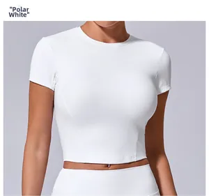Close-up of polar white slim fit crop top with breathable fabric for yoga and fitness