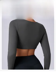 Close-up of slim-fit cropped sports top back view highlighting waist and athletic fabric