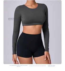 Detail of grey athletic long sleeve top with functional removable chest pads