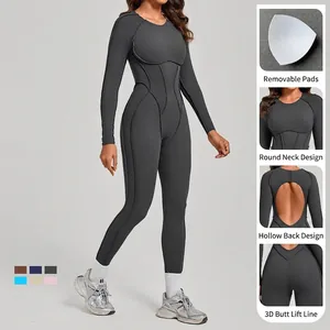 Tuta sportiva aderente a maniche lunghe con schiena scoperta e imbottitura per lo yoga