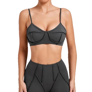 Women's dark grey sports yoga set with thin strap bra and high-waisted leggings