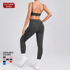 Donkergrijze yogaset met sportbeha en legging met hoge taille en V-vormige achternaad