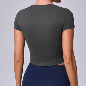 Slim fit dark grey sports crop top for yoga and fitness with back view on model