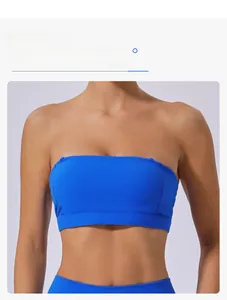 Detail of royal blue yoga bra showing detachable straps and seamless supportive fabric