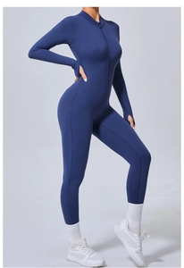 Détail du body de yoga bleu marine avec fermeture éclair frontale et passe-pouces