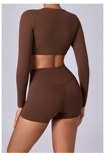 Detailed back view of a dark brown long-sleeve workout top and yoga shorts set