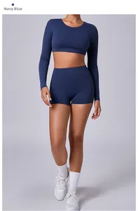 Detail of navy blue long sleeve crop top and high waist shorts gym set for women