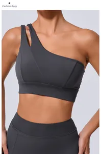 Détail du soutien-gorge de sport gris anthracite à une épaule avec bretelles asymétriques