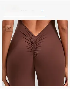 Detail of deep V back cutout and scrunch butt design on dark brown yoga bodysuit