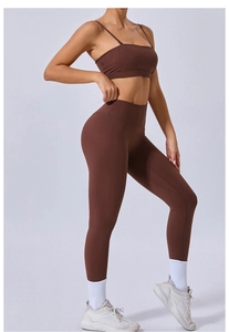 Detail view of chocolate brown high-waist yoga leggings and sports bra set for women