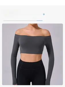 Detail of dark grey off-the-shoulder long sleeve yoga crop top with flexible fit